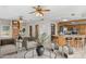 Open concept kitchen and living area with island and modern appliances at 8420 N 15Th St, Phoenix, AZ 85020