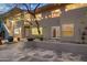 Private patio with string lights and outdoor seating at 8420 N 15Th St, Phoenix, AZ 85020