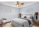 Bright bedroom with ceiling fan and window coverings at 8420 N 15Th St, Phoenix, AZ 85020