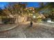 Landscaped front yard with a lighted pathway leading to the home's entrance at 8420 N 15Th St, Phoenix, AZ 85020