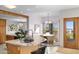Kitchen with granite island, breakfast nook, and patio access at 8420 N 15Th St, Phoenix, AZ 85020