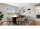 Dining room featuring an oval wooden table and chandelier at 8420 N 15Th St, Phoenix, AZ 85020