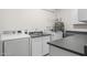 Laundry room with washer, dryer, and utility sink at 8420 N 15Th St, Phoenix, AZ 85020