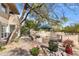 Landscaped backyard oasis with seating area and water fountain at 8420 N 15Th St, Phoenix, AZ 85020