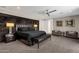 Elegant bedroom with dark wood furniture and plush carpet at 3810 E Devonshire Ave, Phoenix, AZ 85018