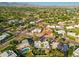 Aerial view showing home's location in a residential area near a lake and mountains at 8436 N Vía Linda --, Scottsdale, AZ 85258