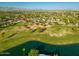 Aerial view of property located on a golf course near a lake at 8436 N Vía Linda --, Scottsdale, AZ 85258