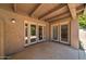 Spacious patio with French doors leading to the backyard at 6601 N 79Th Pl, Scottsdale, AZ 85250