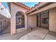 Inviting exterior entrance with decorative iron gate and stone pathway at 6601 N 79Th Pl, Scottsdale, AZ 85250