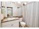 Clean bathroom with white vanity and shower/tub combo at 6900 E Princess Dr # 1136, Phoenix, AZ 85054