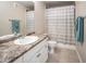 Simple bathroom with white vanity and updated shower at 6900 E Princess Dr # 1136, Phoenix, AZ 85054