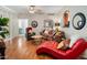 Living room with hardwood floors, stylish furniture, and a cozy atmosphere at 6900 E Princess Dr # 1136, Phoenix, AZ 85054