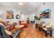 Bright living room featuring hardwood floors and comfy seating at 6900 E Princess Dr # 1136, Phoenix, AZ 85054