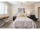 Spacious bedroom with patterned bedding and ensuite access at 6900 E Princess Dr # 1136, Phoenix, AZ 85054