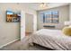 Bedroom with flat screen TV and access to another room at 6900 E Princess Dr # 1136, Phoenix, AZ 85054