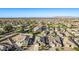 Aerial view of a suburban neighborhood with houses and a park at 2236 W Aston Dr, Queen Creek, AZ 85144