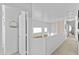 Bright hallway with carpet and access to bedrooms at 3211 E Kerry Ln, Phoenix, AZ 85050