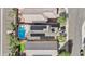 Aerial view showcasing home with solar panels and pool at 3211 E Kerry Ln, Phoenix, AZ 85050