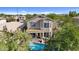 Aerial view of house with pool and surrounding neighborhood at 3211 E Kerry Ln, Phoenix, AZ 85050