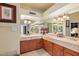 Bathroom features double sinks, wood cabinets, and granite countertops at 26348 N 104Th Way, Scottsdale, AZ 85255