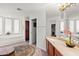 Bathroom with a large tub, double vanity, and a walk-in shower at 26348 N 104Th Way, Scottsdale, AZ 85255