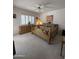 Bedroom with a wooden bed frame and window shutters at 26348 N 104Th Way, Scottsdale, AZ 85255