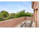 Private balcony with scenic views of the surrounding landscape and neighborhood rooftops at 26348 N 104Th Way, Scottsdale, AZ 85255