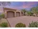 Three-car garage with ample parking space at 26348 N 104Th Way, Scottsdale, AZ 85255