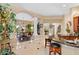 Open concept kitchen with breakfast bar and seating at 26348 N 104Th Way, Scottsdale, AZ 85255
