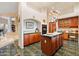 Gourmet kitchen with double oven, center island, and custom cabinetry at 26348 N 104Th Way, Scottsdale, AZ 85255