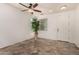 Bright foyer with tile flooring and a ceiling fan at 7311 N 90Th Ave, Glendale, AZ 85305