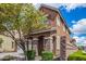 Two-story house with a side view of the house at 7311 N 90Th Ave, Glendale, AZ 85305