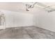 Garage with concrete floor and extra storage at 7311 N 90Th Ave, Glendale, AZ 85305