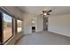 Large bedroom with plush carpeting and en-suite bathroom access at 8758 E Obispo Ave, Mesa, AZ 85212