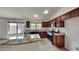 Modern kitchen with granite countertops and stainless steel appliances at 8758 E Obispo Ave, Mesa, AZ 85212