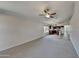 Spacious living area with high ceilings and views of kitchen at 8758 E Obispo Ave, Mesa, AZ 85212