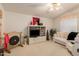 Living room with off-white couch and ceiling fan at 3301 S Goldfield Rd # 3004, Apache Junction, AZ 85119