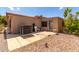 Private patio with gravel landscaping and AC unit at 3301 S Goldfield Rd # 3004, Apache Junction, AZ 85119