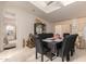 Formal dining room with a black table and six chairs, offering space for Gathering meals at 3301 S Goldfield Rd # 3004, Apache Junction, AZ 85119