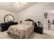 Well-lit bedroom with a queen-size bed and updated furnishings at 3301 S Goldfield Rd # 3004, Apache Junction, AZ 85119