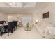 Spacious living room with a comfortable sofa and large windows, providing ample natural light at 3301 S Goldfield Rd # 3004, Apache Junction, AZ 85119