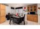 Kitchen dining area with a table and chairs, perfect for casual meals at 3301 S Goldfield Rd # 3004, Apache Junction, AZ 85119