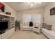 Living Room with off-white couch and decorative items at 3301 S Goldfield Rd # 3004, Apache Junction, AZ 85119