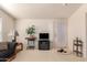 Inviting living room with a flat-screen TV and patio access at 3301 S Goldfield Rd # 3004, Apache Junction, AZ 85119