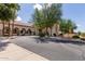 Building entrance with fountain and landscaping at 3301 S Goldfield Rd # 3004, Apache Junction, AZ 85119