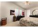 Bright bedroom with a queen-size bed and ensuite access at 3301 S Goldfield Rd # 3004, Apache Junction, AZ 85119