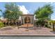 Community entrance with fountain and landscaping at 3301 S Goldfield Rd # 3004, Apache Junction, AZ 85119