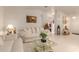 Relaxing living room, featuring a comfy white couch and decorative accents at 3301 S Goldfield Rd # 3004, Apache Junction, AZ 85119