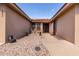Front entry with walkway, desert landscaping, and Asian decor at 3301 S Goldfield Rd # 3004, Apache Junction, AZ 85119