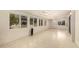 Bright sunroom featuring tile floors and multiple windows at 3301 S Goldfield Rd # 3004, Apache Junction, AZ 85119